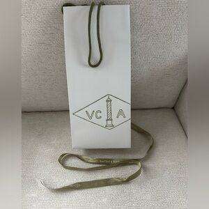 Van Cleef & Arpels White Bag with Green Ribbon